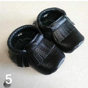 Black fringe moccasins